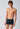 General view of a men model wearing SK nightfusion selection microfibre Trunks 2 pack