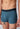 Close-up view of a men model wearing SK nightfusion selection microfibre Trunks 2 pack