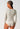 Back view of a women model wearing SK dune flowers cotton Shirt long sleeve