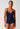 Front view of a women model wearing SK cheeky navy microfibre Camisole remov. pads