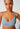 Close-up view of a women model wearing SK sterling blue cotton Soft bra remov. pads