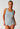 Front view of a women model wearing SK sterlingivory selection cotton Tank top 2 pack
